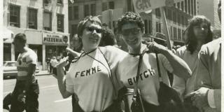 Photograph of Nancy Tucker and partner in Butch-Femme t-shirts
