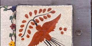 Ceramic tile of a bird at 100 W