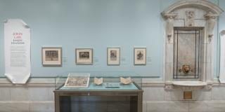 Photograph of exhibition showing one side of the gallery corridor