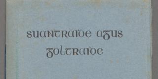 blue-grey paper cover of book with typed title "Suantraidhe Agus Goltraidhe"