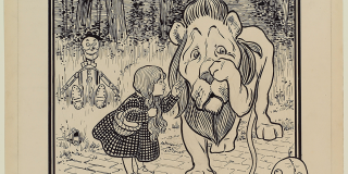 Historic print of William Wallace Denslow’s original illustration for The Wonderful Wizard of Oz, featuring an image of Dorothy comforting a crying lion with Toto, the Scarecrow, and the Tin Man surrounding them.