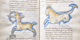 Painted astrological signs (Centaur and Goat) against handwritten text