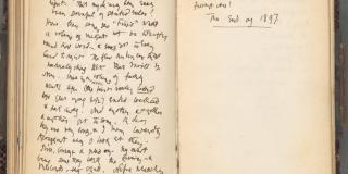 A diary entry dated Saturday, January 1st, 1898 lays open to two handwritten pages ending with the underlined phrase, "The end of 1897".