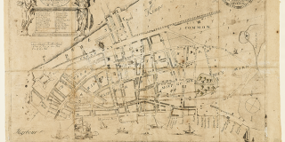Printed map on tan paper showing the streets of 18th-century New York.